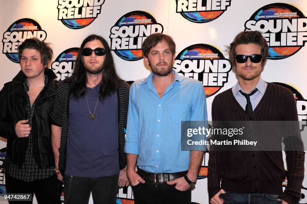 Matthew Followill, Nathan Followill, Caleb Followill and Jared Followill of Kings Of Leon pose for a group portrait at the Sound Relief Bushfire...