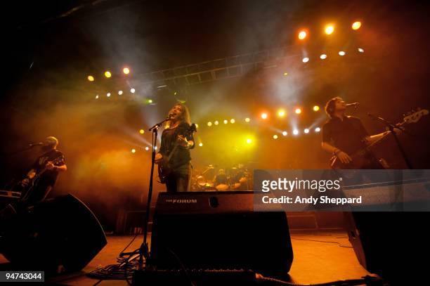 Marshall Gill, Justin Sullivan and Peter Nelson of New Model Army perform on stage at The Forum on December 17, 2009 in London, England.