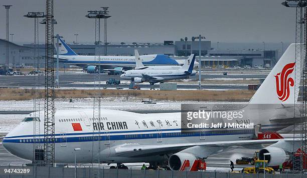Air Force One and the plane of Chinese Prime Minister Wen Jiabao are, along with other aircraft, waiting to return World leaders home, after their...