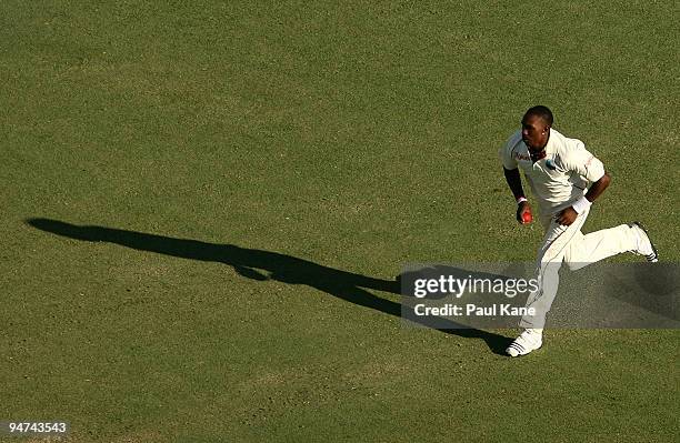 Dwayne Bravo of the West Indies runs in to bowl during day three of the Third Test match between Australia and the West Indies at WACA on December...