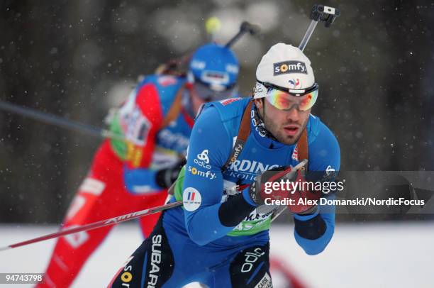 Simon Fourcade of France competes during the Men's 20km Individual in the e.on Ruhrgas IBU Biathlon World Cup on December 17, 2009 in Pokljuka,...