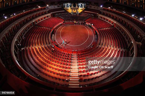 Runners from the Royal Albert Hall and the Royal Philharmonic Orchestra mark the 100 year anniversary of the first indoor marathon held in England by...