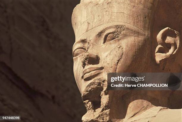 Egypt, Amon. Temple of Amon-Rê in Karnak, East Thebes. This limestone statue of the god Amon is placed in a large pillared room in the temple. It is...