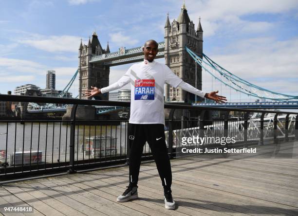 Mo Farah of Great Britain poses in front of Tower Bridge prior to the weekends Virgin Money London Marathon on April 17, 2018 in London, England.