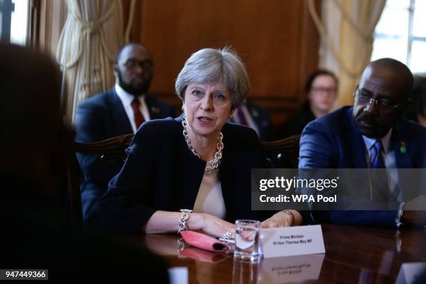 Britain's Prime Minister Theresa May hosts a meeting with leaders and representatives of Caribbean countries at 10 Downing Street on April 17, 2017...