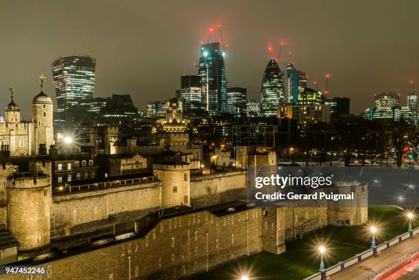 tower of london and the city of london at night - gerard puigmal stock pictures, royalty-free photos & images