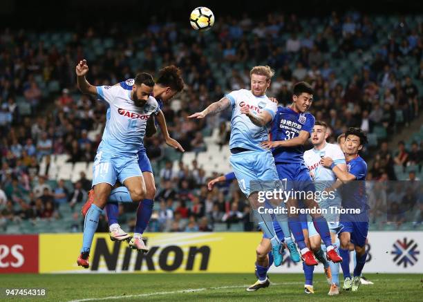 David Carney of Sydney heads the ball during the AFC Champions League match between Sydney FC and Shaghai Shenhua at Sydney Football Stadium on April...