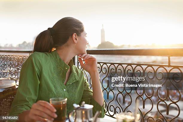 woman in jamaa al-fna square - marrakesh stock pictures, royalty-free photos & images