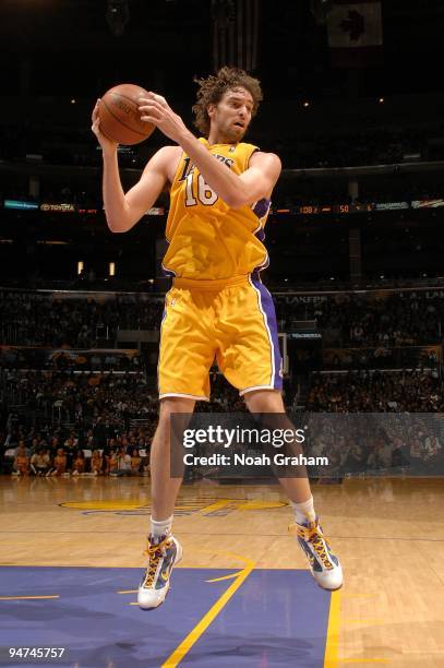 Pau Gasol of the Los Angeles Lakers rebounds the ball during the game against the Utah Jazz on December 9, 2009 at Staples Center in Los Angeles,...