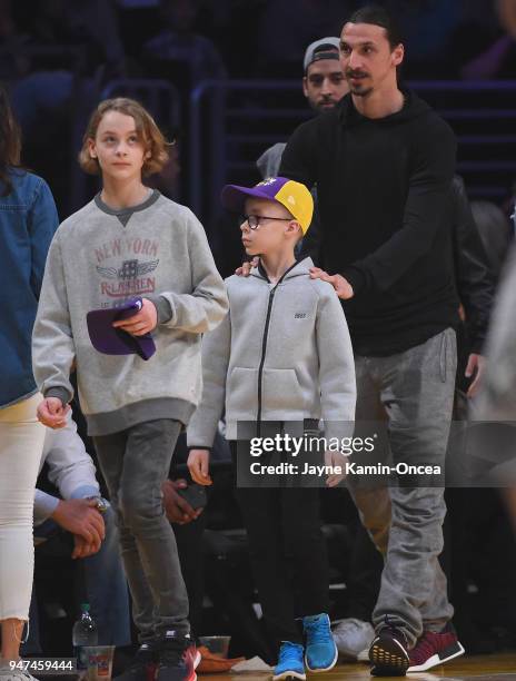 Zlatan Ibrahimovi"u008d of the Los Angeles Galaxy attends the game between the Los Angeles Lakers and the Minnesota Timberwolves with his wife Helena...