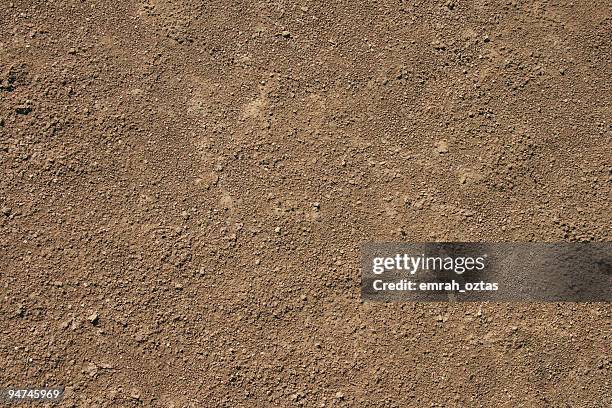 fine brown sand dirt background - rock stock pictures, royalty-free photos & images