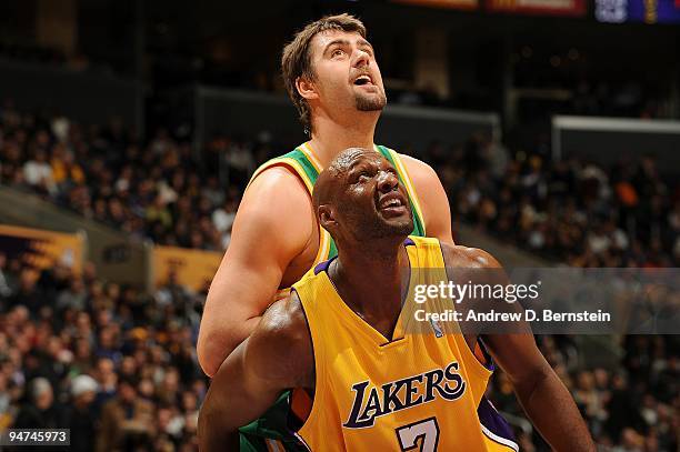 Lamar Odom of the Los Angeles Lakers boxes out Mehmet Okur of the Utah Jazz during the game on December 9, 2009 at Staples Center in Los Angeles,...