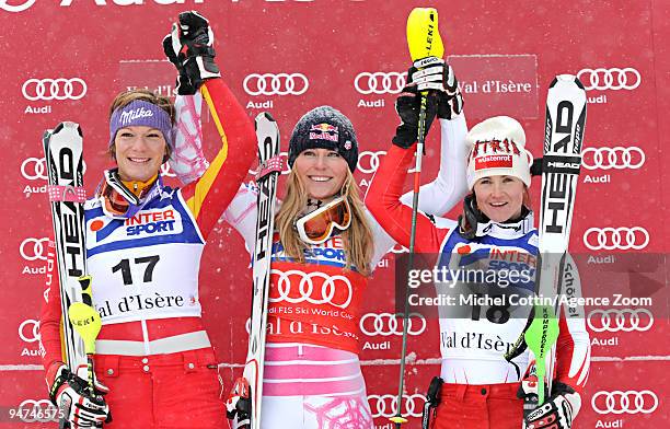 Lindsey Vonn of the USA takes 1st place, Maria Riesch of Germany takes 2nd place, Elisabeth Goergl of Austria takes 3rd place during the Audi FIS...