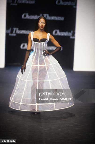 Top Model Naomi Campbell Presents A Chantal Thomass Model At Ready To Wear Spring Summer 1995 Show, Paris, October 1994.