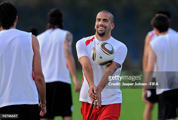 Juan Veron of Estudiantes juggles the ball during a training session on December 18, 2009 in Abu Dhabi, United Arab Emirates. Estudiantes will face...