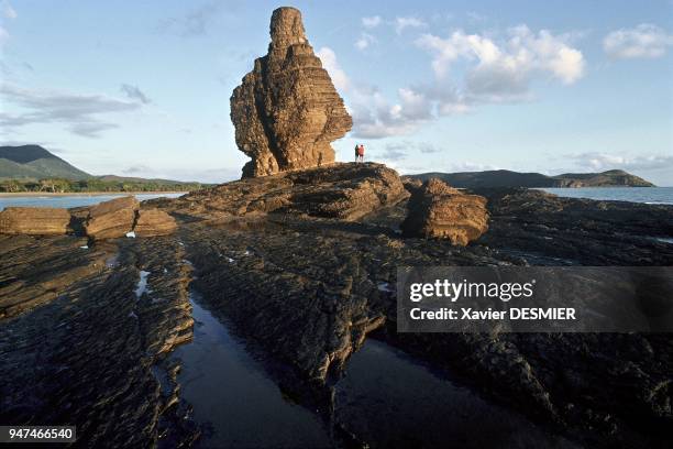 New Caledonia, the pierced rock near Bourail. Nouvelle-Calédonie, La roche percée près de Bourail.