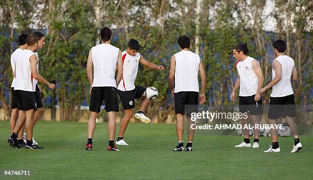 Players of Argentina's Estudiantes de La Plata practice during a training session in the Gulf emirate of Abu Dhabi on December 18 on the eve of their...