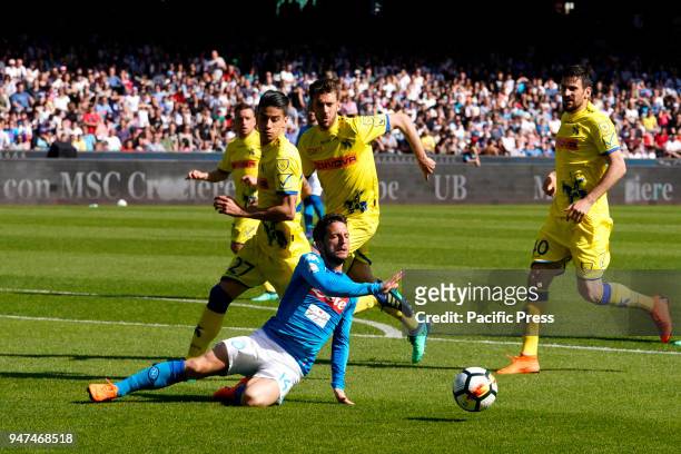 Dries Mertens of S.S.C. Napoli and Depaoli Fabio and Tomovic Nenad of Chievo Verona fights for the ball during Serie A match between S.S.C. Napoli...