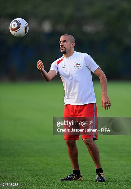 Juan Sebastian Veron of Estudiantes catches the ball during a training session on December 18, 2009 in Abu Dhabi, United Arab Emirates. Estudiantes...