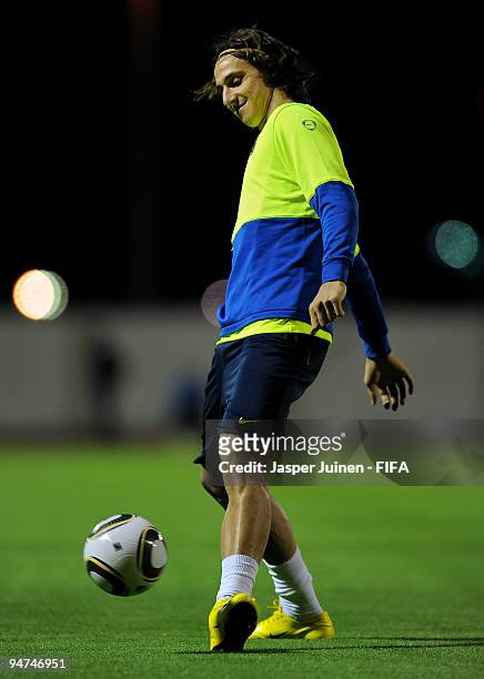 Zlatan Ibrahimovic of FC Barcelona strikes the ball during a training session on December 18, 2009 in Abu Dhabi, United Arab Emirates. Barcelona will...