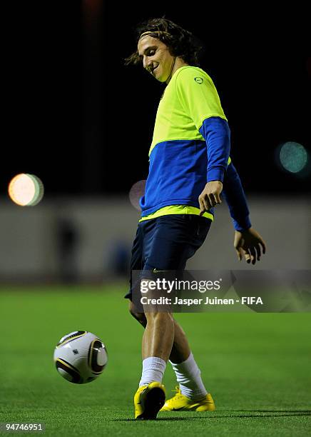 Zlatan Ibrahimovic of FC Barcelona strikes the ball during a training session on December 18, 2009 in Abu Dhabi, United Arab Emirates. Barcelona will...