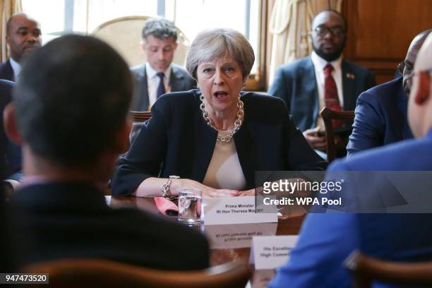 Britain's Prime Minister Theresa May hosts a meeting with leaders and representatives of Caribbean countries at 10 Downing Street on April 17, 2017...