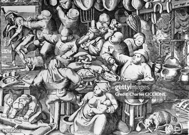 La cuisine grasse?, préparation du repas dans une famille riche, gravure de Pieter van der Heyden, d'après un dessin de Pieter Brueghel l'Ancien.