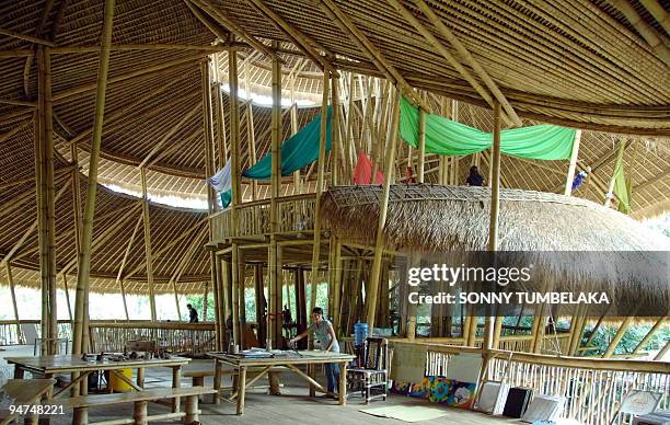 Climate-Indonesia-environment-education,FEATURE, by Stephen Coates A teacher work on a class of green school in Badung on December 9, 2009. Founded...