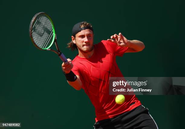 Lucas Pouille of France hits a forehand return during his Mens Singles match against Mischa Zverev of Germany at Monte-Carlo Sporting Club on April...