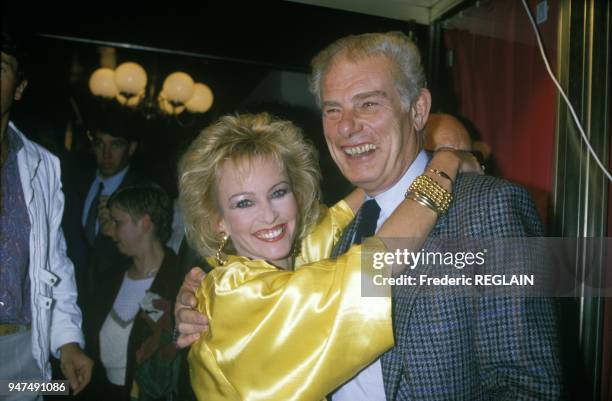 Jean Amadou with Evelyne Leclercq during the openeing of her restaurant le 'Cotton' in Paris, October 7, 1986.