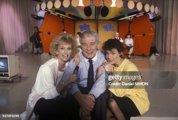 Presenters Fabienne Egal And Evelyne Leclercq with Jean Amadou On Set of Show Tournez Maneges, Paris, April 1987.