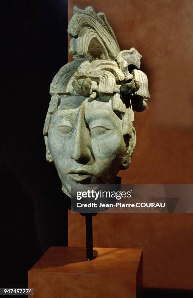 Found in the crypt of the temple of inscriptions near Pacal's tomb, this juvenile face with tangled hair, could represent him as a young person or...