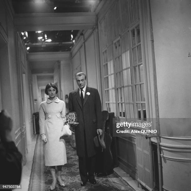 Audrey Hepburn and Gary Cooper.