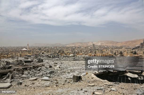 General view of destruction in Douma on the outskirts of Damascus on April 17, 2018 after the Syrian army declared that all anti-regime forces have...