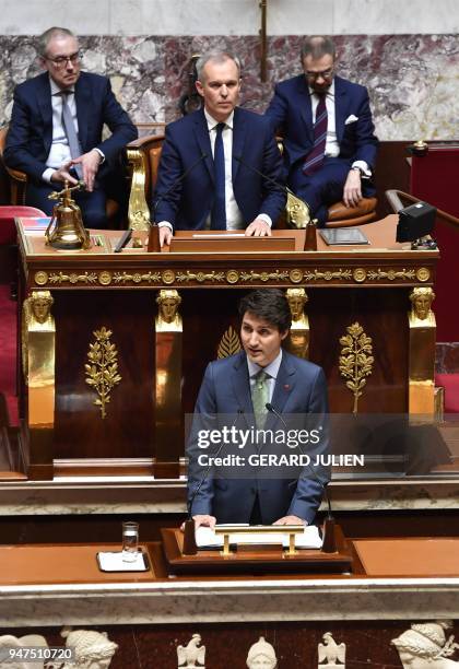 French lawmakers applaud as Canadian Prime Minister Justin Trudeau delivers a speech as Presient of the French National Assembly Francois de Rugy...