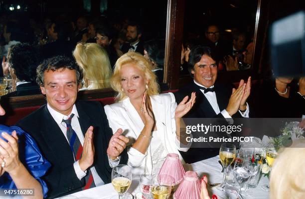 Sylvie Vartan with Michel Sardou and Tony Scotti, 1994.