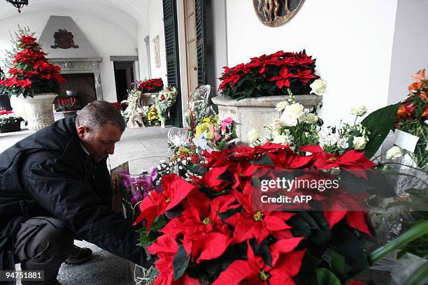 Flowers are delivered at Villa San Martino, the house where Italian Prime Minister Silvio Berlusconi is getting some rest after leaving hospital the...