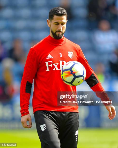 Watford's Miguel Britos warms up ahead of the match