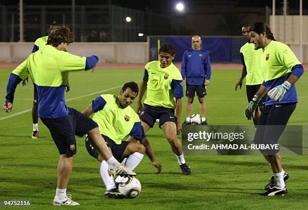 Barcelona's players practice during a training session in the Gulf emirate of Abu Dhabi on December 18 on the eve of their 2009 FIFA Club World Cup...