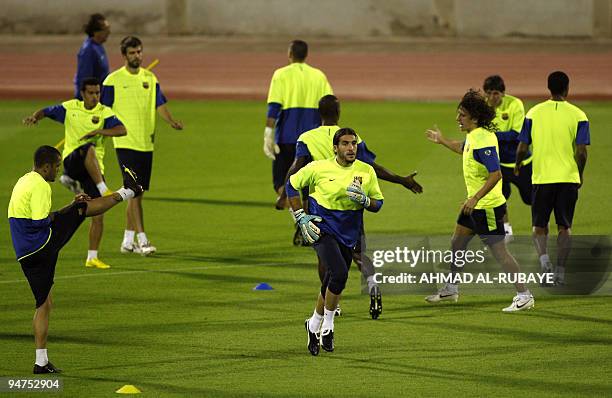 Barcelona's players practice during a training session in the Gulf emirate of Abu Dhabi on December 18 on the eve of their 2009 FIFA Club World Cup...