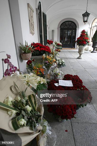 Flowers are displayed at Villa San Martino, the house where Italian Prime Minister Silvio Berlusconi is getting some rest after leaving hospital the...