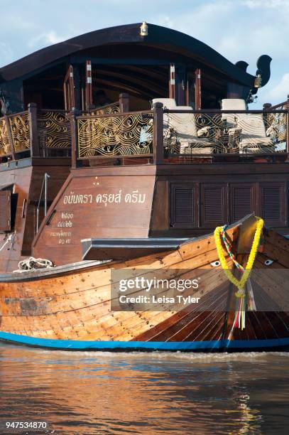 The Anantara Dream, a 100-year old refurbished teak river boat, on the Chao Phraya river.