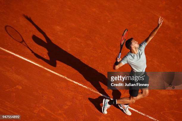 Grigor Dimitrov of Bulgaria serves during his Mens Singles match against Pierre-Hughes Herbert of France at Monte-Carlo Sporting Club on April 17,...