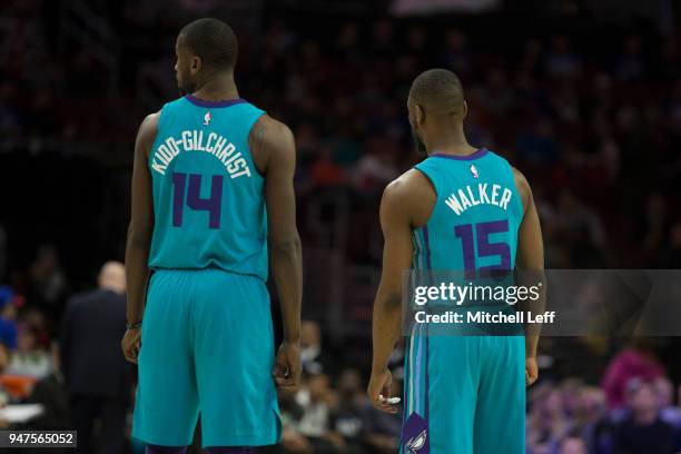 Michael Kidd-Gilchrist and Kemba Walker of the Charlotte Hornets look on against the Philadelphia 76ers at the Wells Fargo Center on March 2, 2018 in...