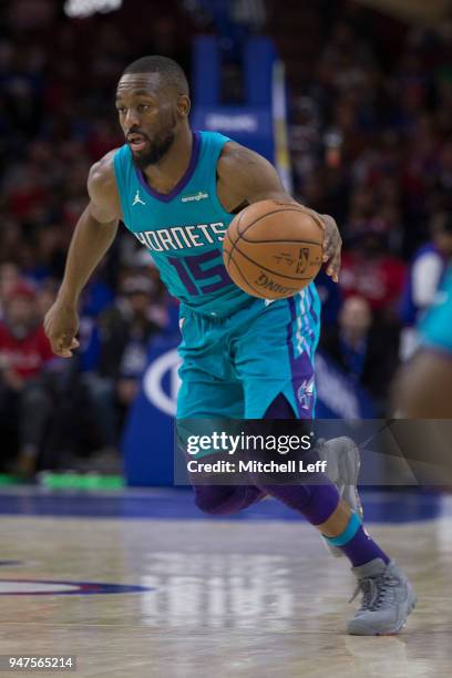 Kemba Walker of the Charlotte Hornets drives to the basket against the Philadelphia 76ers at the Wells Fargo Center on March 2, 2018 in Philadelphia,...