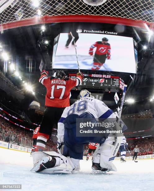 Patrick Maroon of the New Jersey Devils celebrates a goal by Will Butcher against Andrei Vasilevskiy of the Tampa Bay Lightning in Game Three of the...