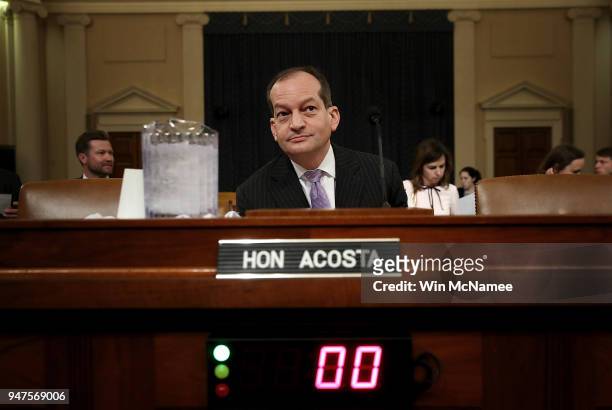 Labor Secretary Alexander Acosta prepares to testify before the House Ways and Means Committee April 17, 2018 in Washington, DC. Acosta testified on...