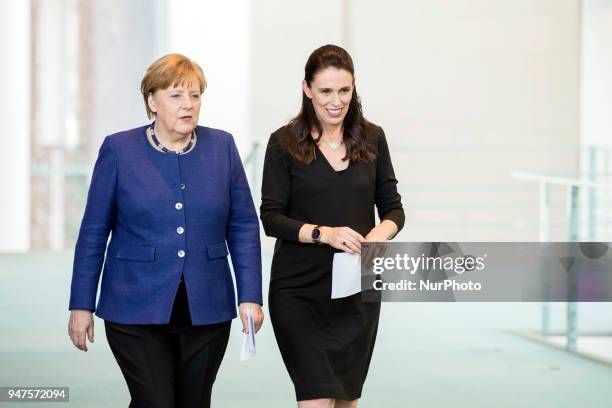 German Chancellor Angela Merkel and Prime Minister of New Zealand Jacinda Ardern arrive to a news conference at the Chancellery in Berlin, Germany on...