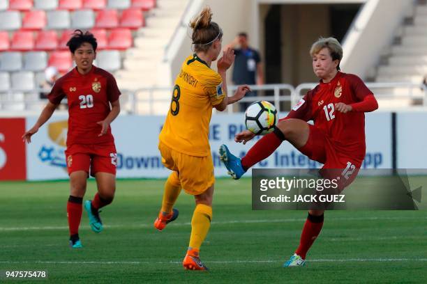 Australia's forward Elise Kellond-Knight vies for the ball with Thailand's midfielder Rattikan Thongsombut during the AFC Women's Asian Cup semi...
