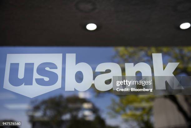 Bancorp signage is displayed on the door to a branch in Alameda, California, U.S., on Monday, April 9, 2018. US Bancorp is scheduled to release...